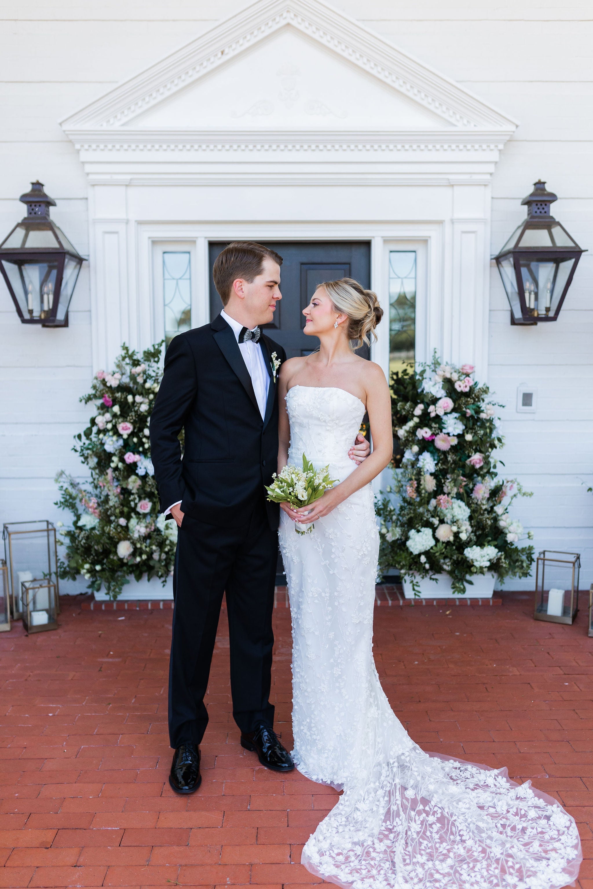 Bride and groom looking at each other